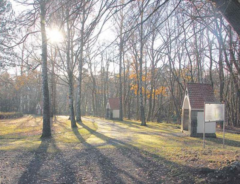 Das Kreuz von Menschen auf der Flucht